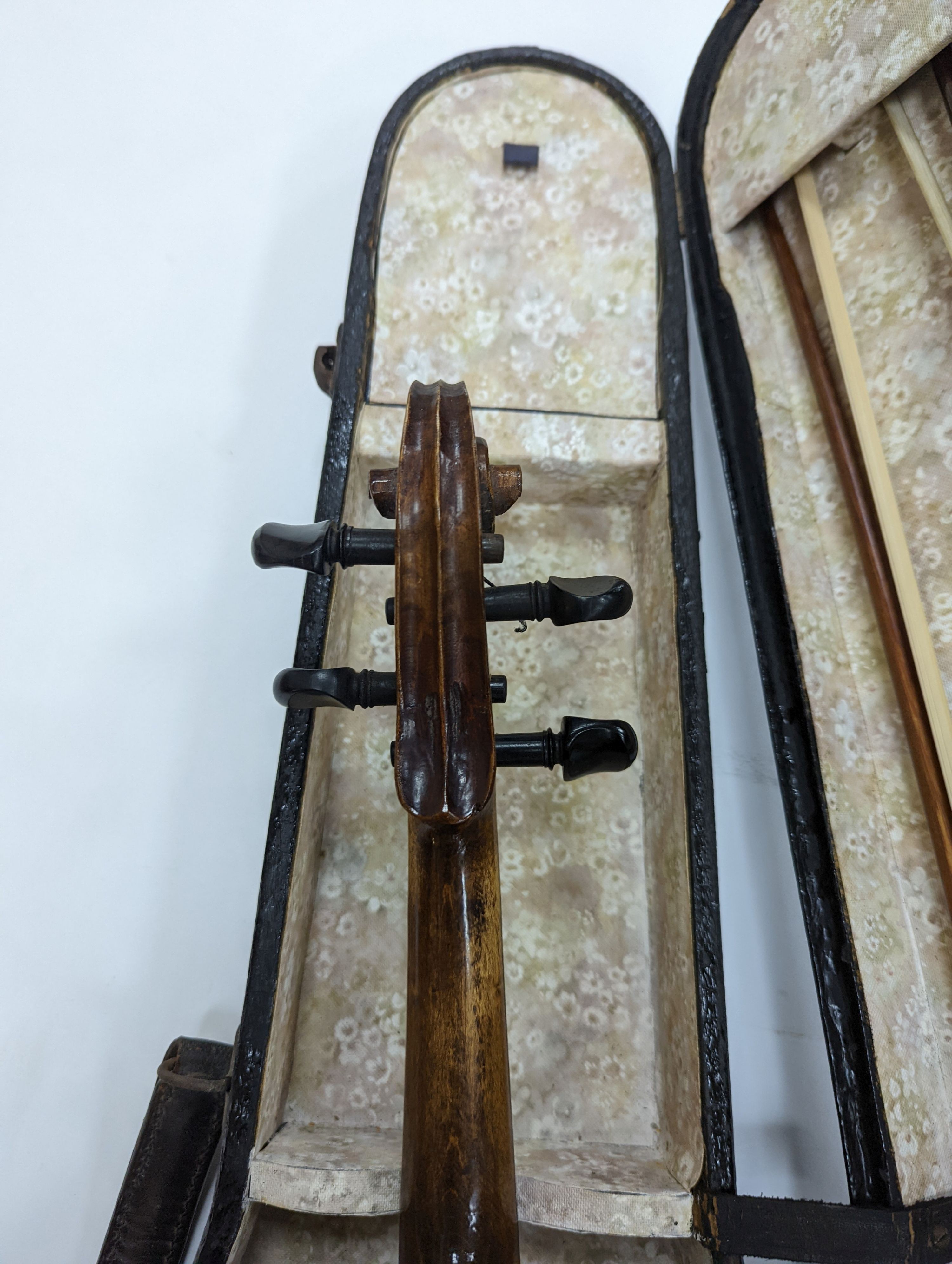 Two cased violins and bows, one with ‘Antonius Straduarius Cremonensis Faciebat Anno 17/13 Made In Czechoslovakia’ label to interior